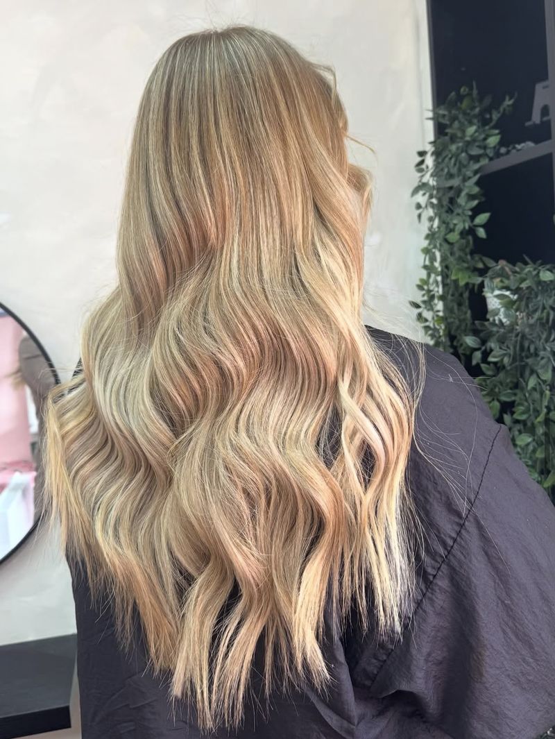 Long waved hair with a sandy blonde blend